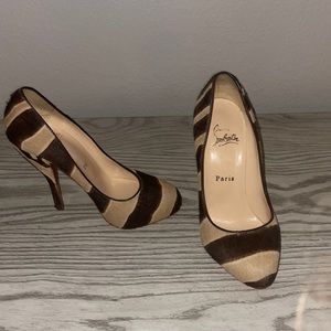 Beautiful calf hair animal print platform red bottoms!